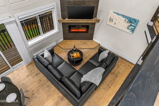 a view of table and chair with wooden floor