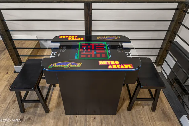 a bedroom with a bed and a television