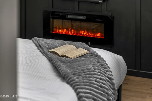 a view of a balcony with a yard