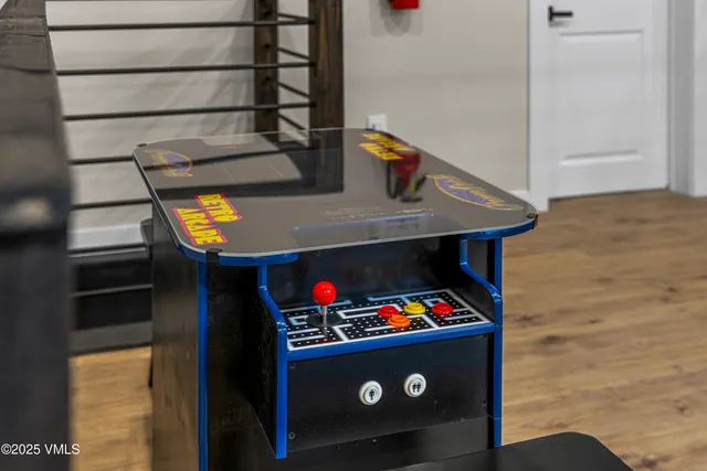 an aerial view of a house with a yard and garden