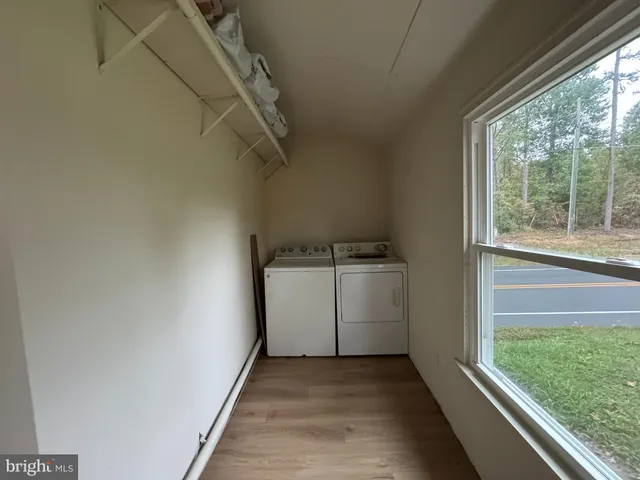 a view of a utility room with washer and dryer