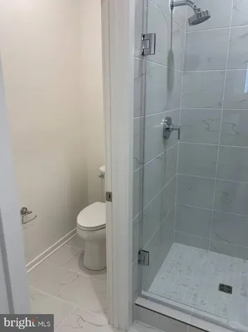 a view of a small space with racks on the wall