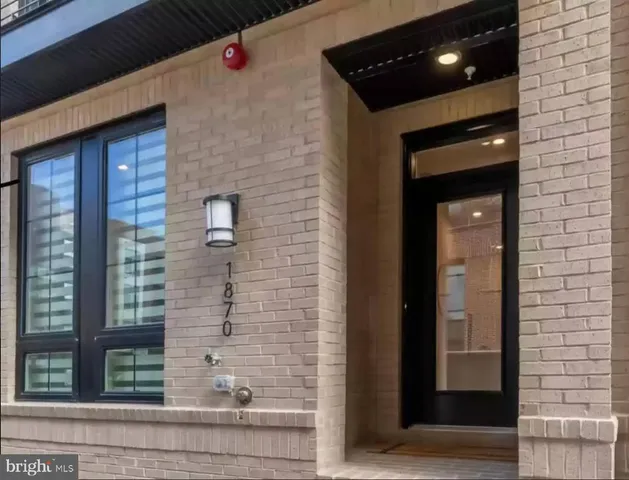 a front view of a house with shower