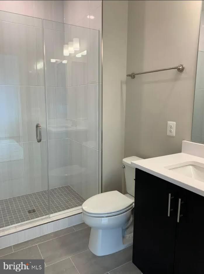 1870 Easterly Road Reston, VA 20190 - Photo 29 of 33 a bathroom with a sink a toilet and shower