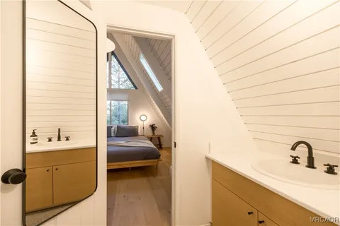 a bathroom with a shower and a toilet