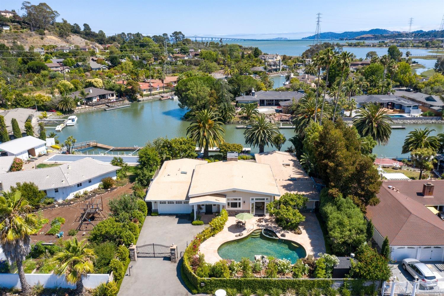 320 Point San Pedro Road San Rafael, CA 94901 - Photo 1 of 1 an aerial view of a house with outdoor space and lake view