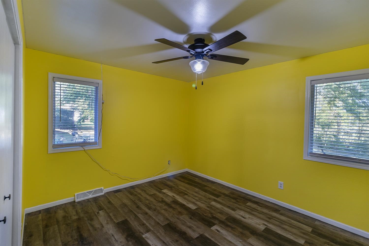115 Lamplighter Loop Southeast Poplar Grove, IL 61065 - Photo 12 of 27 a view of a room with a window and a ceiling fan