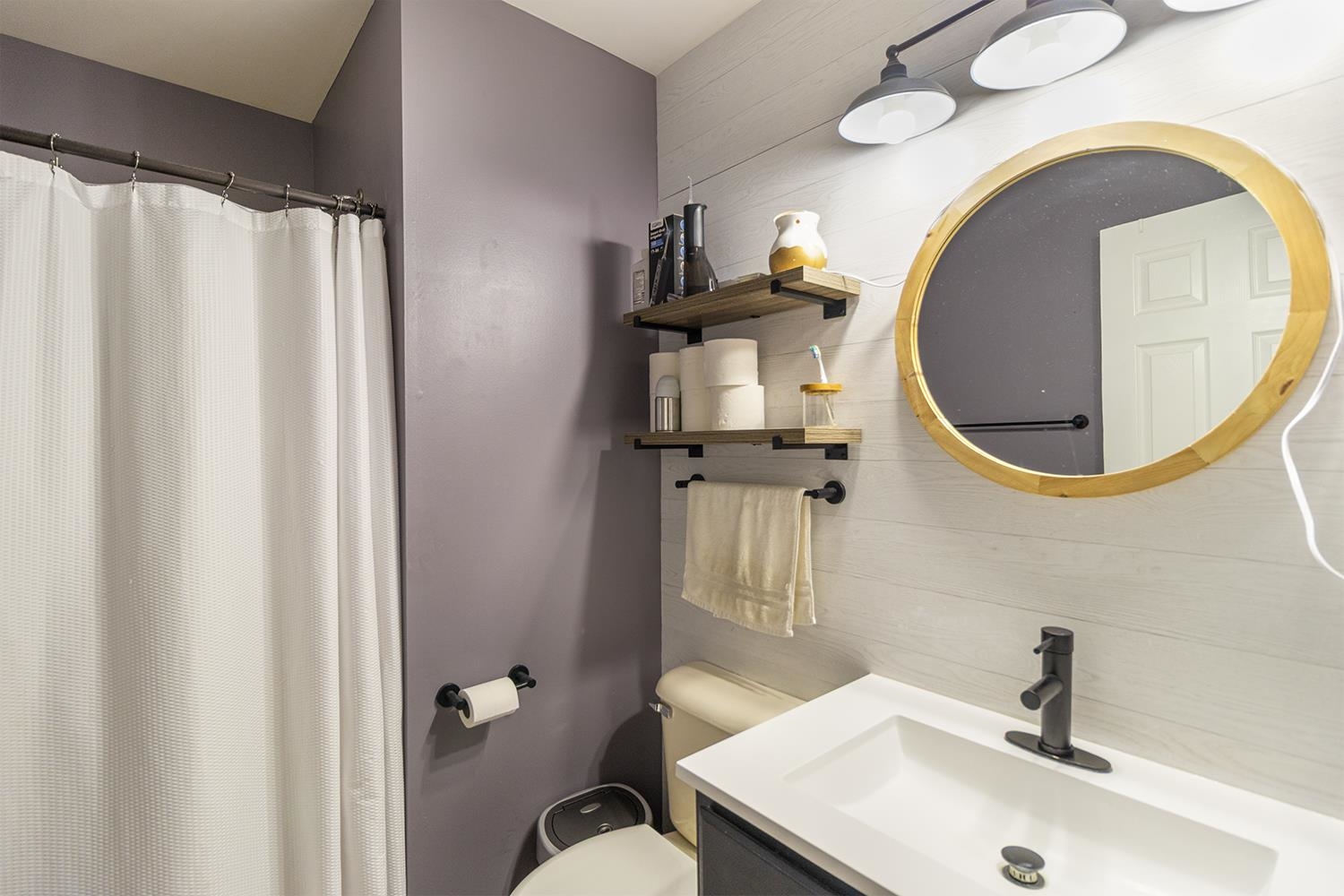 115 Lamplighter Loop Southeast Poplar Grove, IL 61065 - Photo 17 of 27 a bathroom with a sink and a mirror