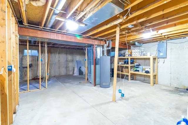 a view of a room with wooden shelves