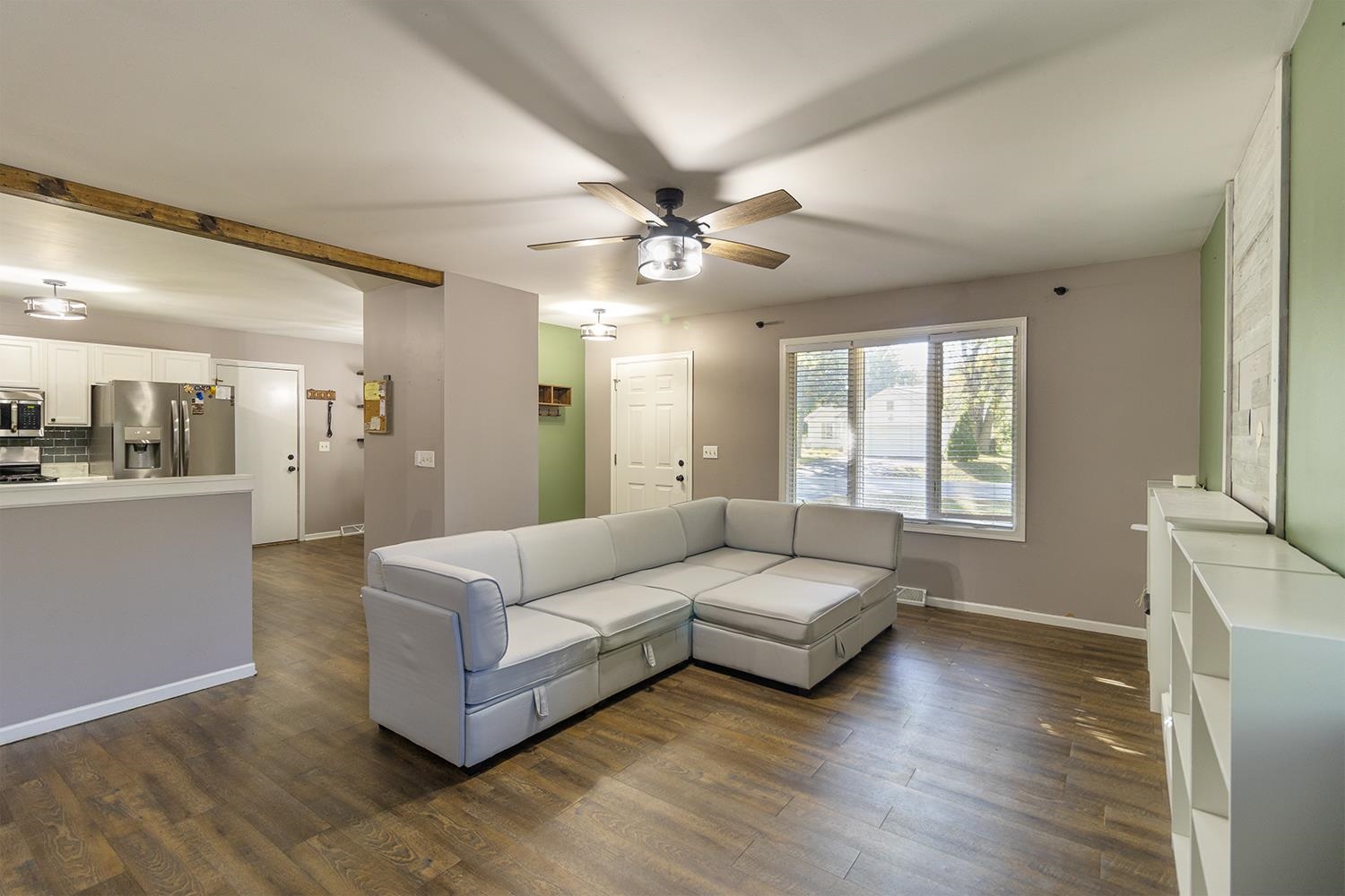 115 Lamplighter Loop Southeast Poplar Grove, IL 61065 - Photo 3 of 27 a living room with furniture and a large window