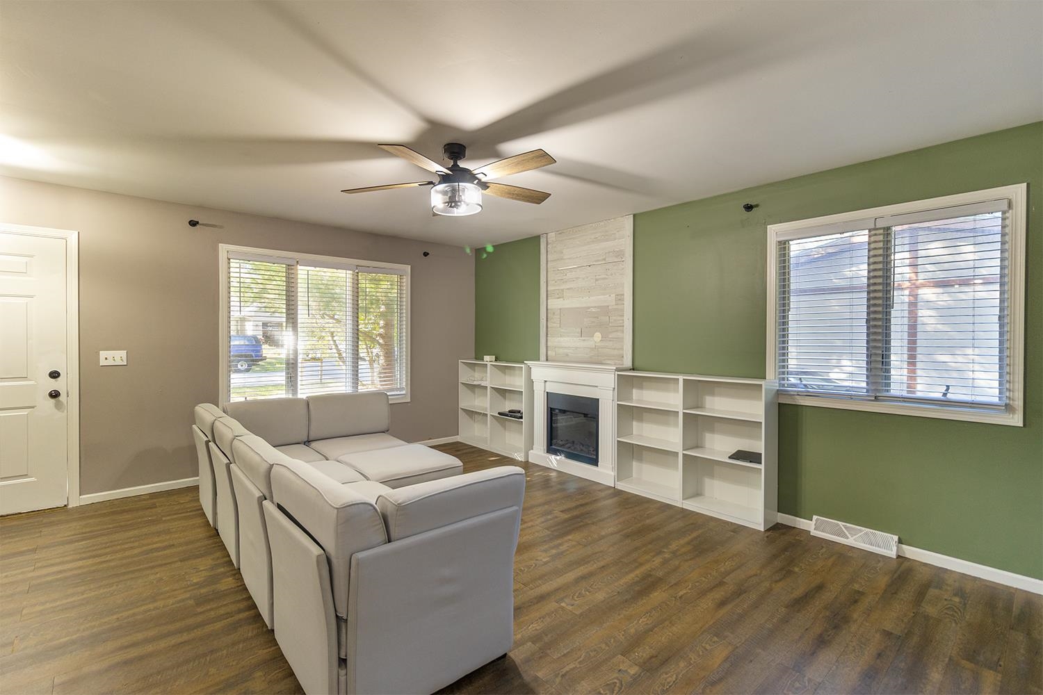 115 Lamplighter Loop Southeast Poplar Grove, IL 61065 - Photo 4 of 27 a living room with furniture and a large window