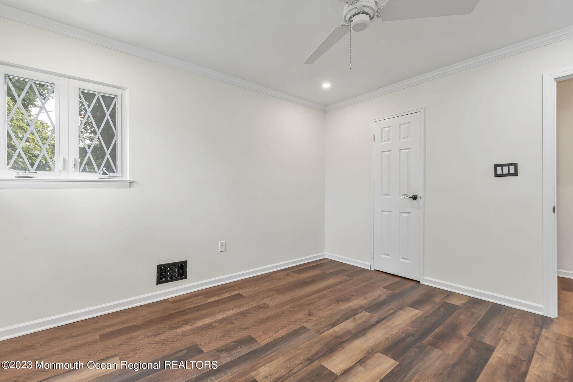28 Copperfield Drive Hamilton, NJ 08610 - Photo 15 of 26 a view of empty room with wooden floor and fan