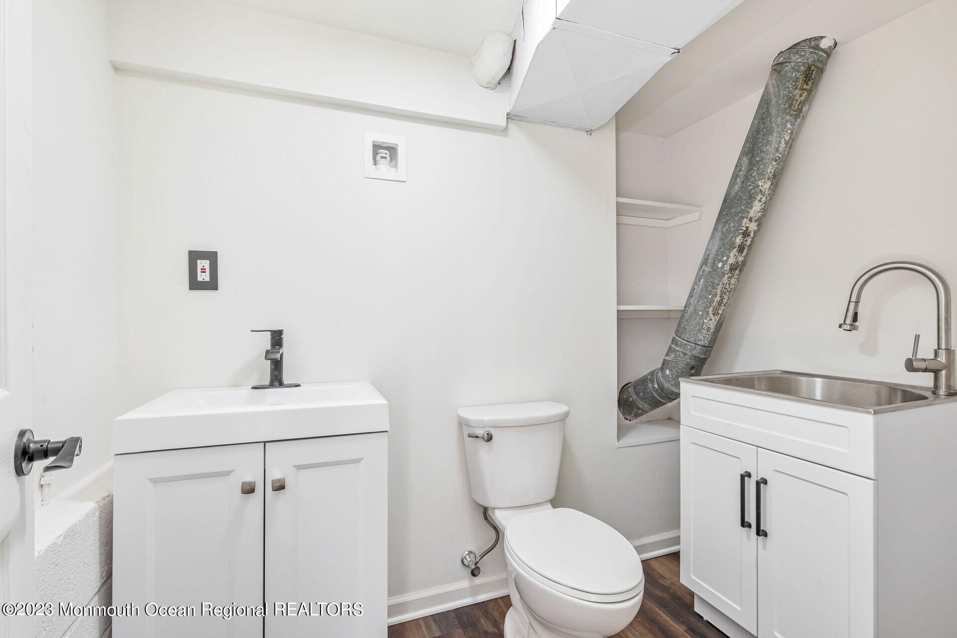 28 Copperfield Drive Hamilton, NJ 08610 - Photo 20 of 26 a white toilet sitting next to a bathroom sink