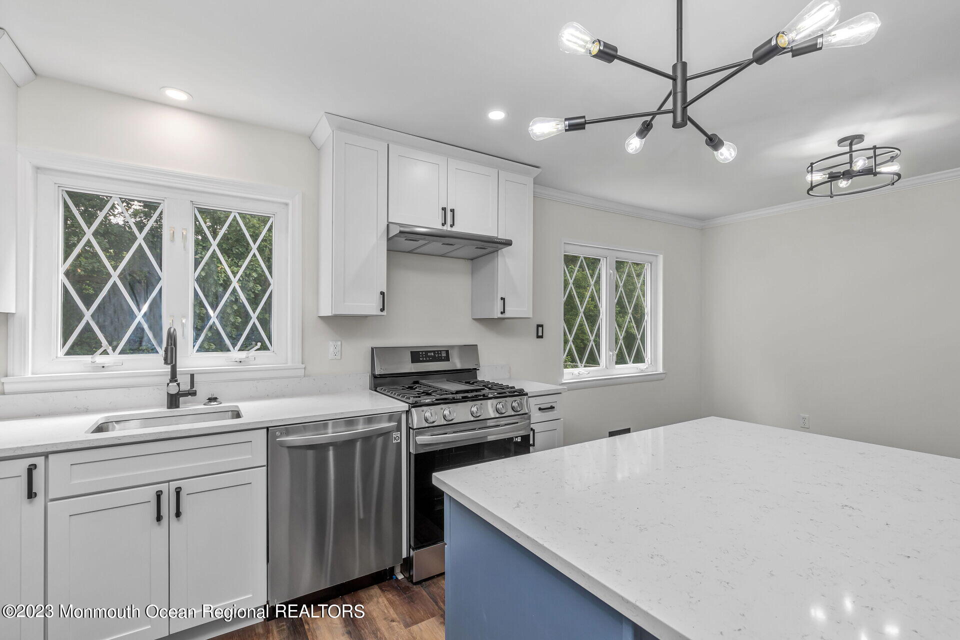 28 Copperfield Drive Hamilton, NJ 08610 - Photo 3 of 26 a kitchen with a stove a sink and a window