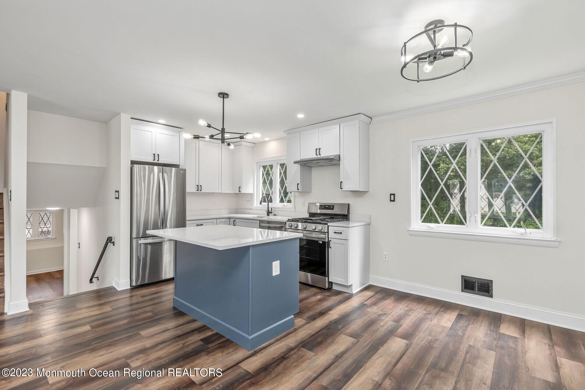 28 Copperfield Drive Hamilton, NJ 08610 - Photo 5 of 26 a kitchen with stainless steel appliances granite countertop a stove and a refrigerator