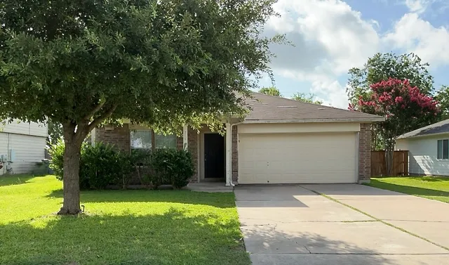 a front view of house with yard