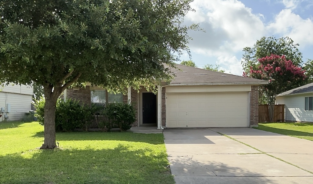 a front view of house with yard