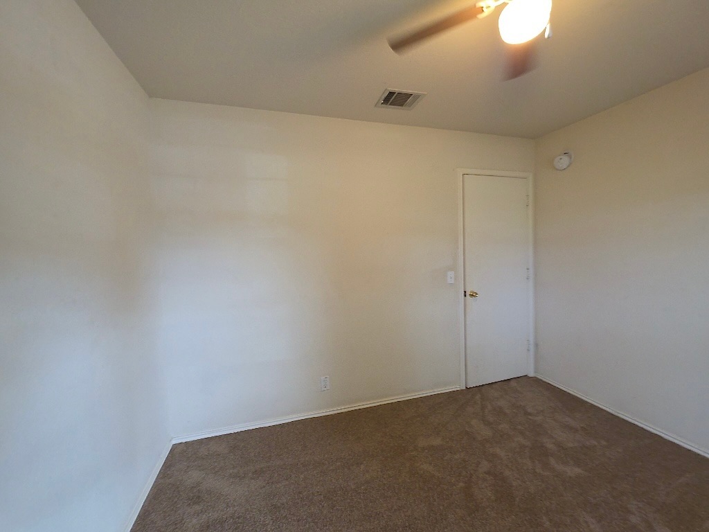 210 Delby Street Hutto, TX 78634 - Photo 10 of 15 a view of an empty room
