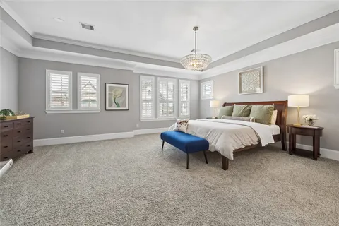 a view of cabinets with racks on the wall