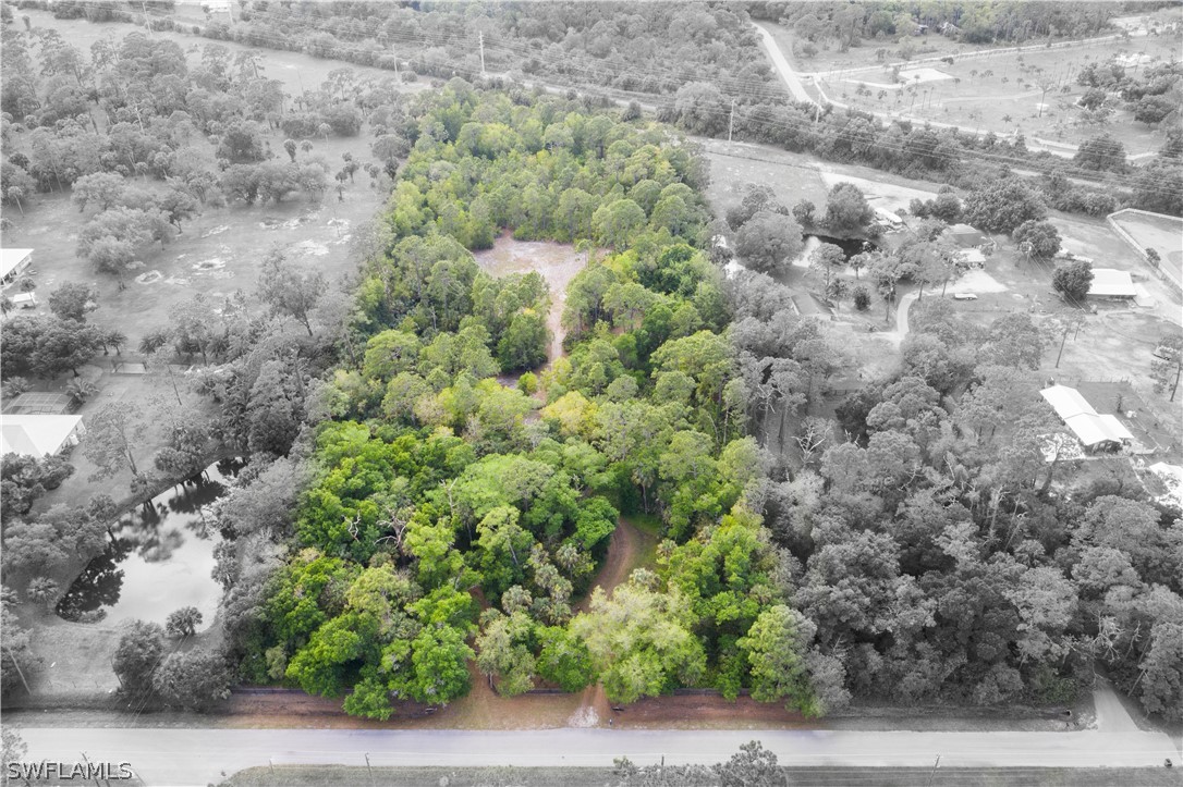 3990 Staley Road Fort Myers, FL 33905 - Photo 25 of 35 a aerial view of a houses with a yard