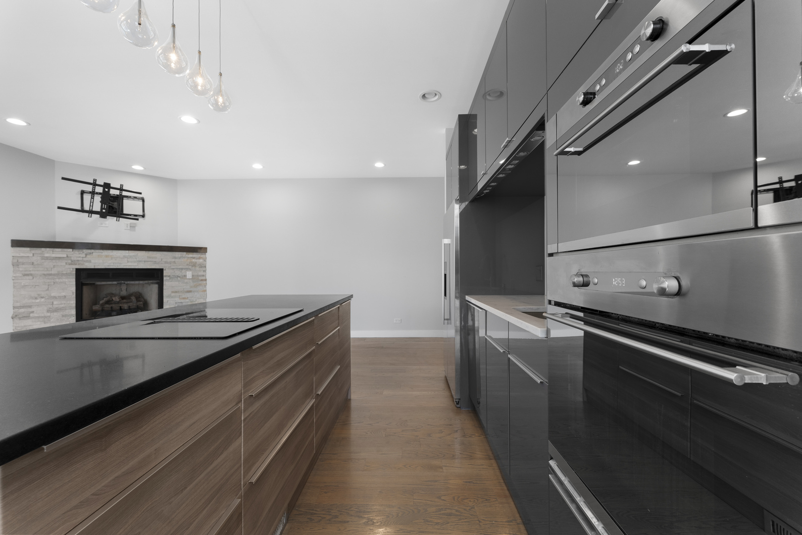 1555 North Talman Avenue, Unit 3F Chicago, IL 60622 - Photo 11 of 37 a kitchen with a stove and a sink
