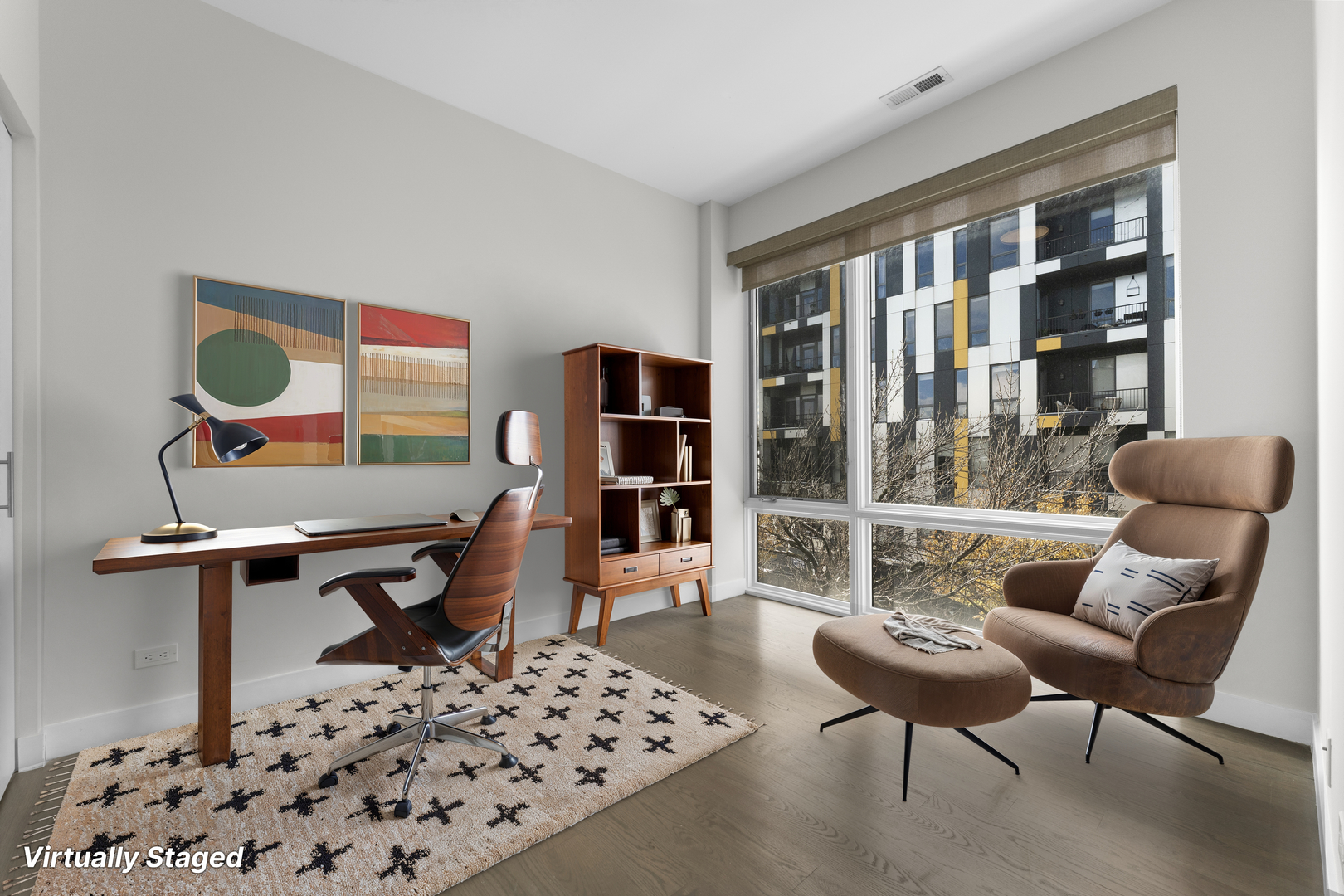 1555 North Talman Avenue, Unit 3F Chicago, IL 60622 - Photo 12 of 37 a living room with furniture a piano and a bookshelf