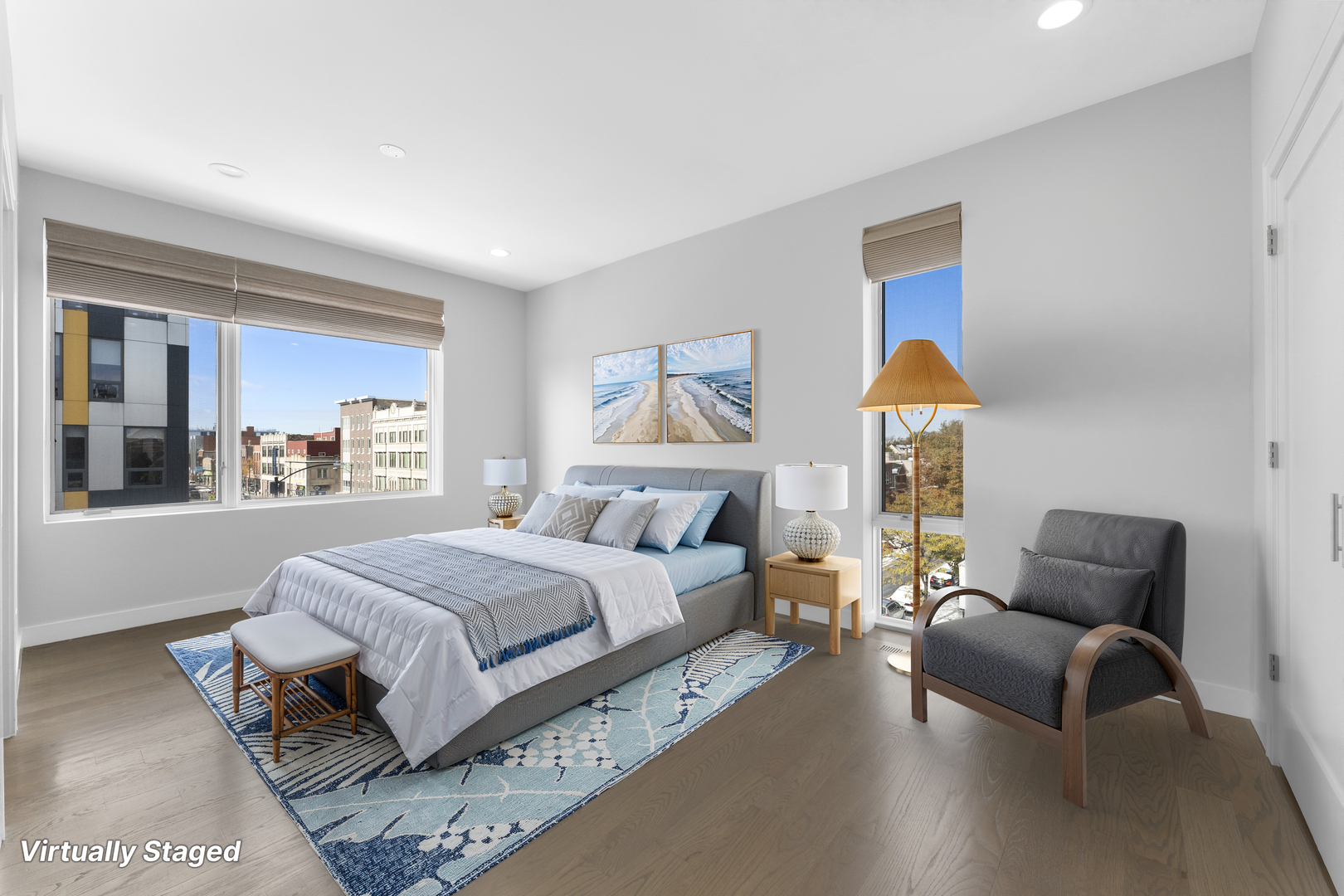 1555 North Talman Avenue, Unit 3F Chicago, IL 60622 - Photo 18 of 37 a spacious bedroom with a bed and a couch