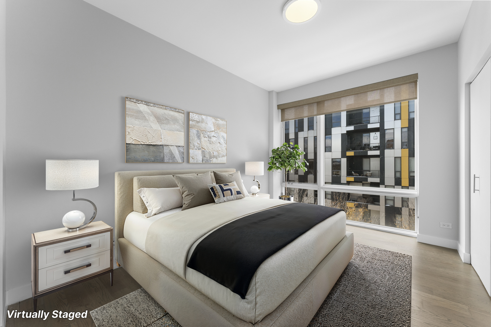 1555 North Talman Avenue, Unit 3F Chicago, IL 60622 - Photo 26 of 37 a bedroom with a large bed and a window