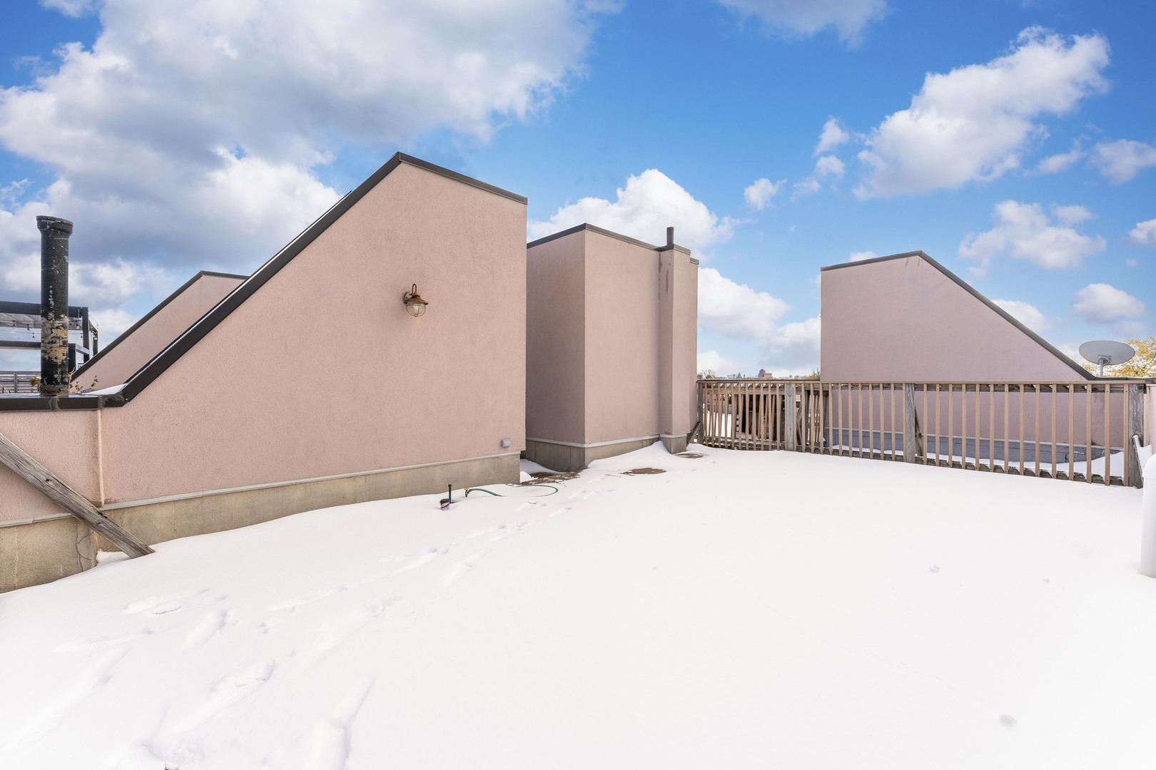 1555 North Talman Avenue, Unit 3F Chicago, IL 60622 - Photo 33 of 37 a view of a house with a snow in the background