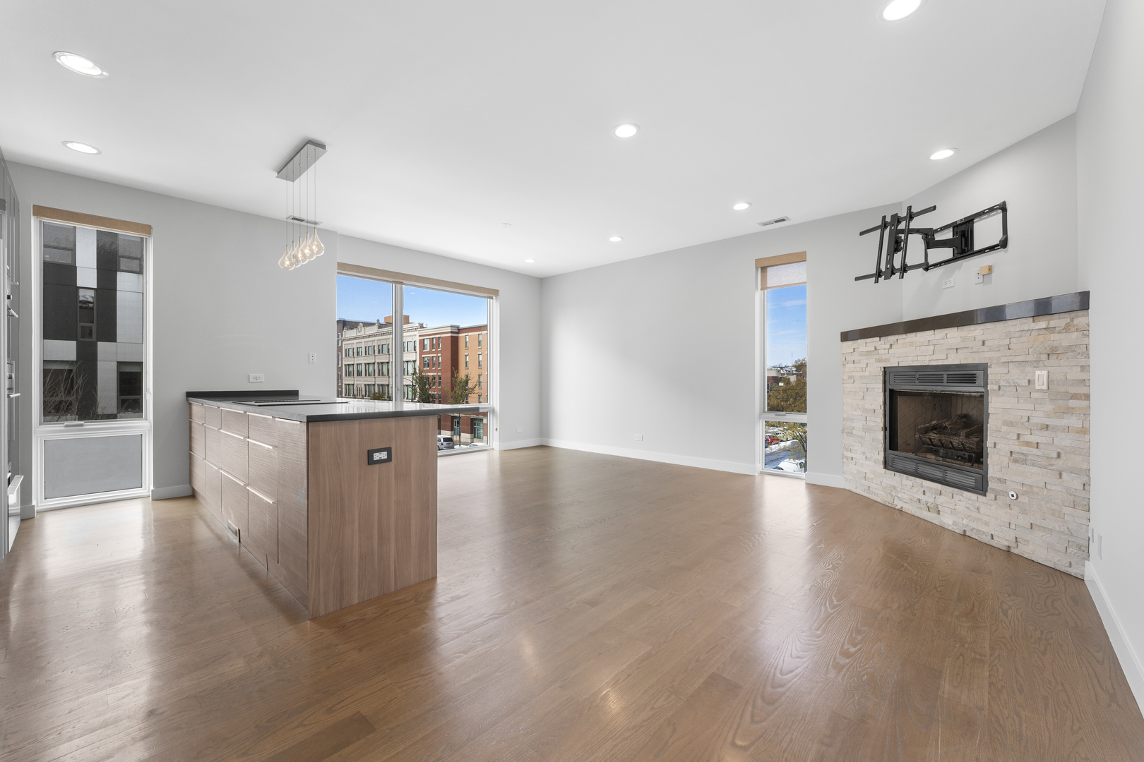 1555 North Talman Avenue, Unit 3F Chicago, IL 60622 - Photo 4 of 37 a view of kitchen with cabinets and wooden floor