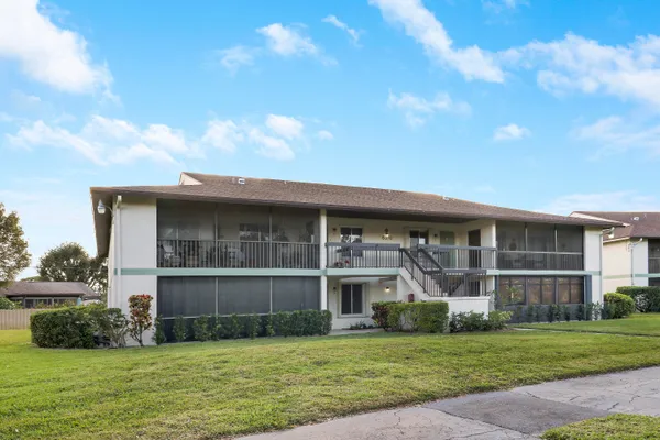 a view of a back yard of the house