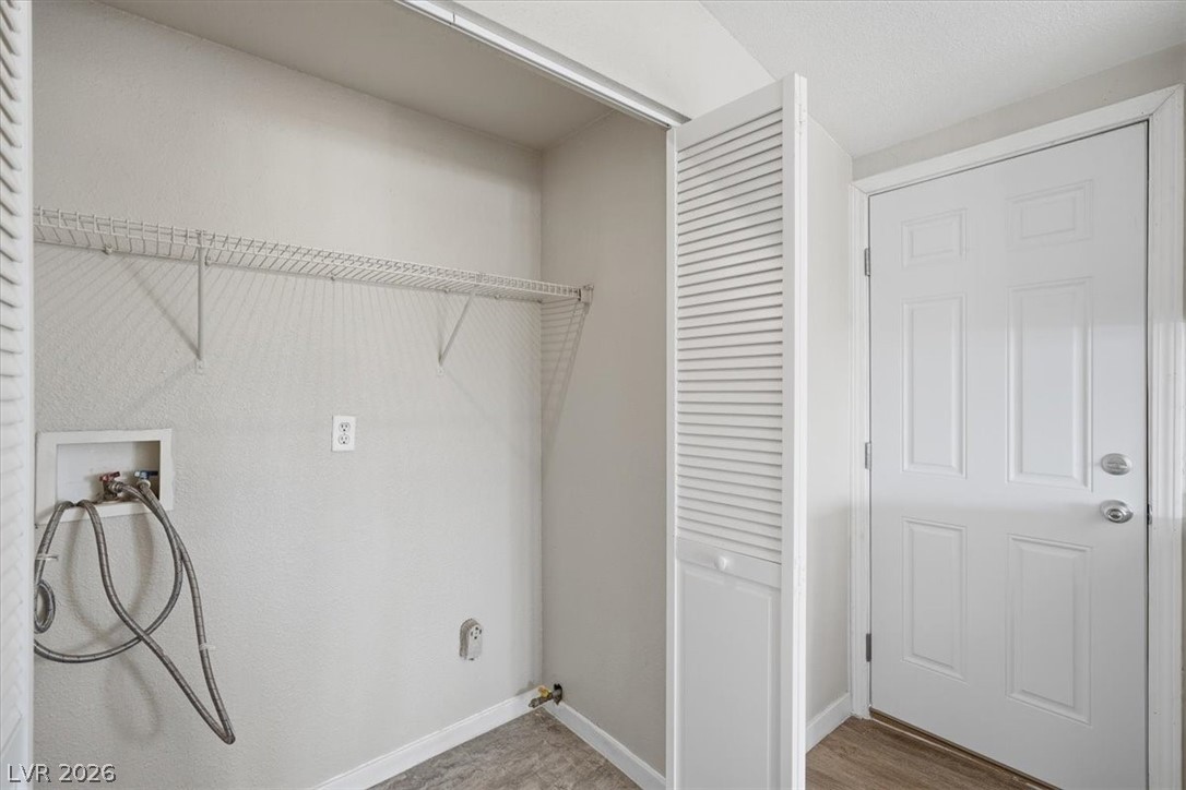 283 Aztec Lane Henderson, NV 89015 - Photo 12 of 21 Functional utility closet featuring wire shelving and durable flooring.