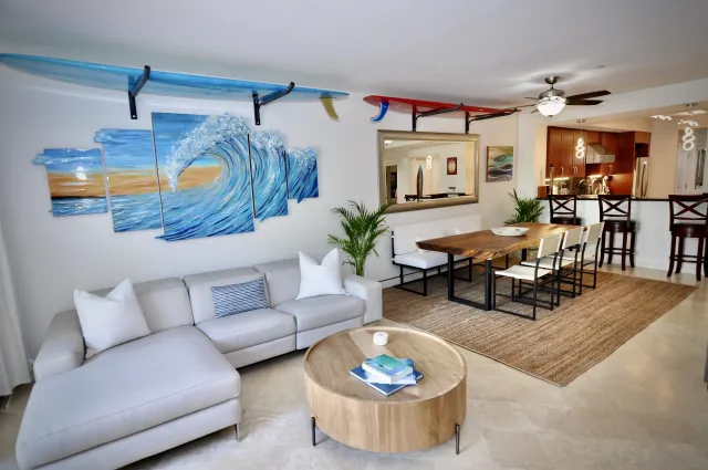 a living room with furniture and a table