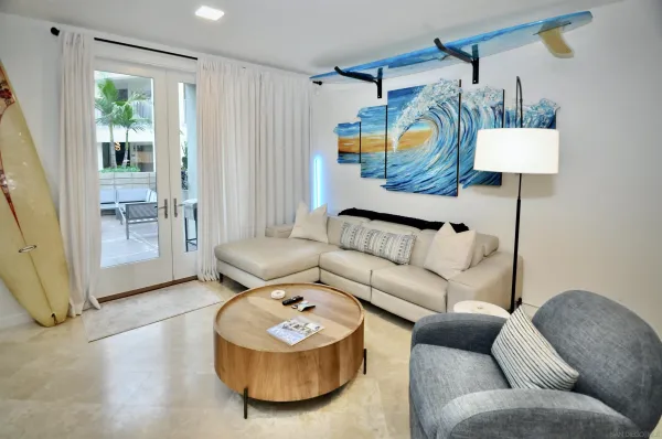 a living room with furniture and a table