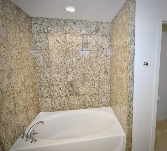a bathroom with a bathtub