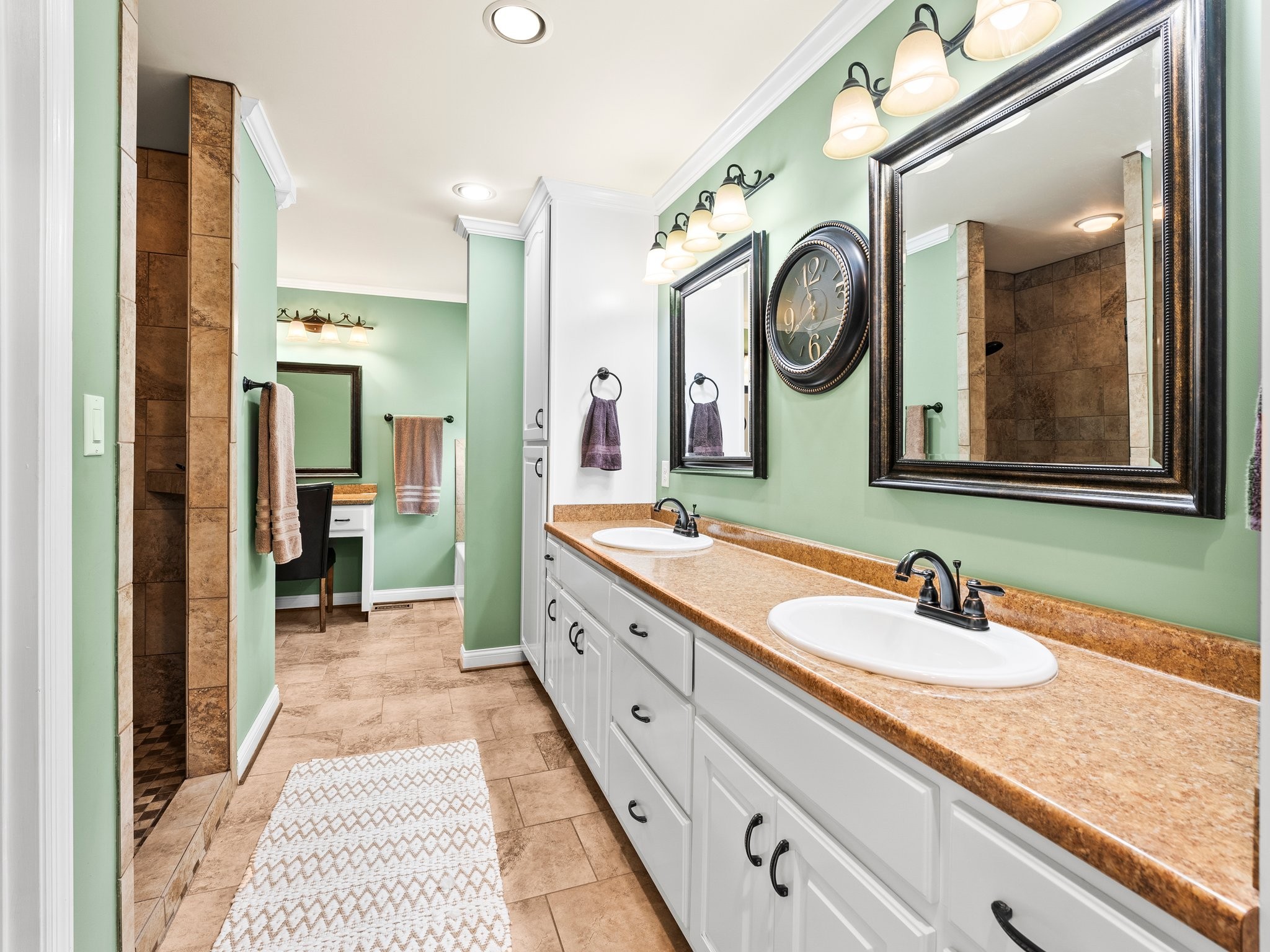 1574 Midway Road Sewanee, TN 37375 - Photo 20 of 45 a spacious bathroom with a sink double vanity and a mirror