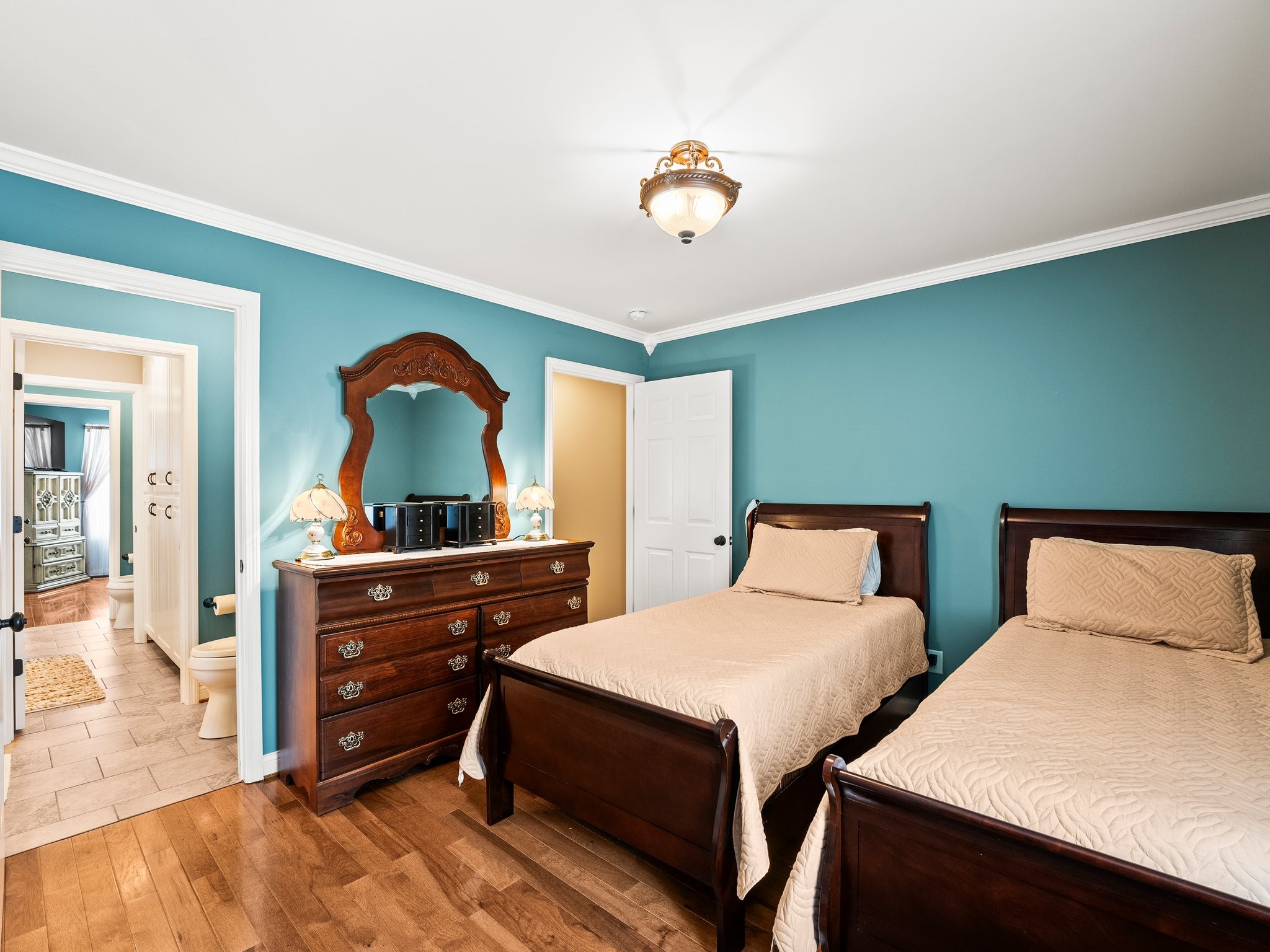 1574 Midway Road Sewanee, TN 37375 - Photo 23 of 45 a bedroom with two beds and a dresser
