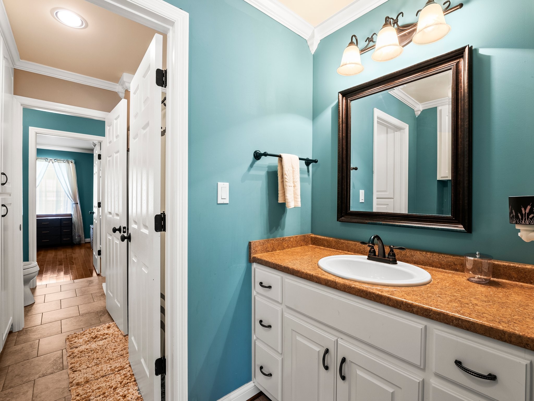 1574 Midway Road Sewanee, TN 37375 - Photo 26 of 45 a en suite bathroom with a sink double vanity and a mirror