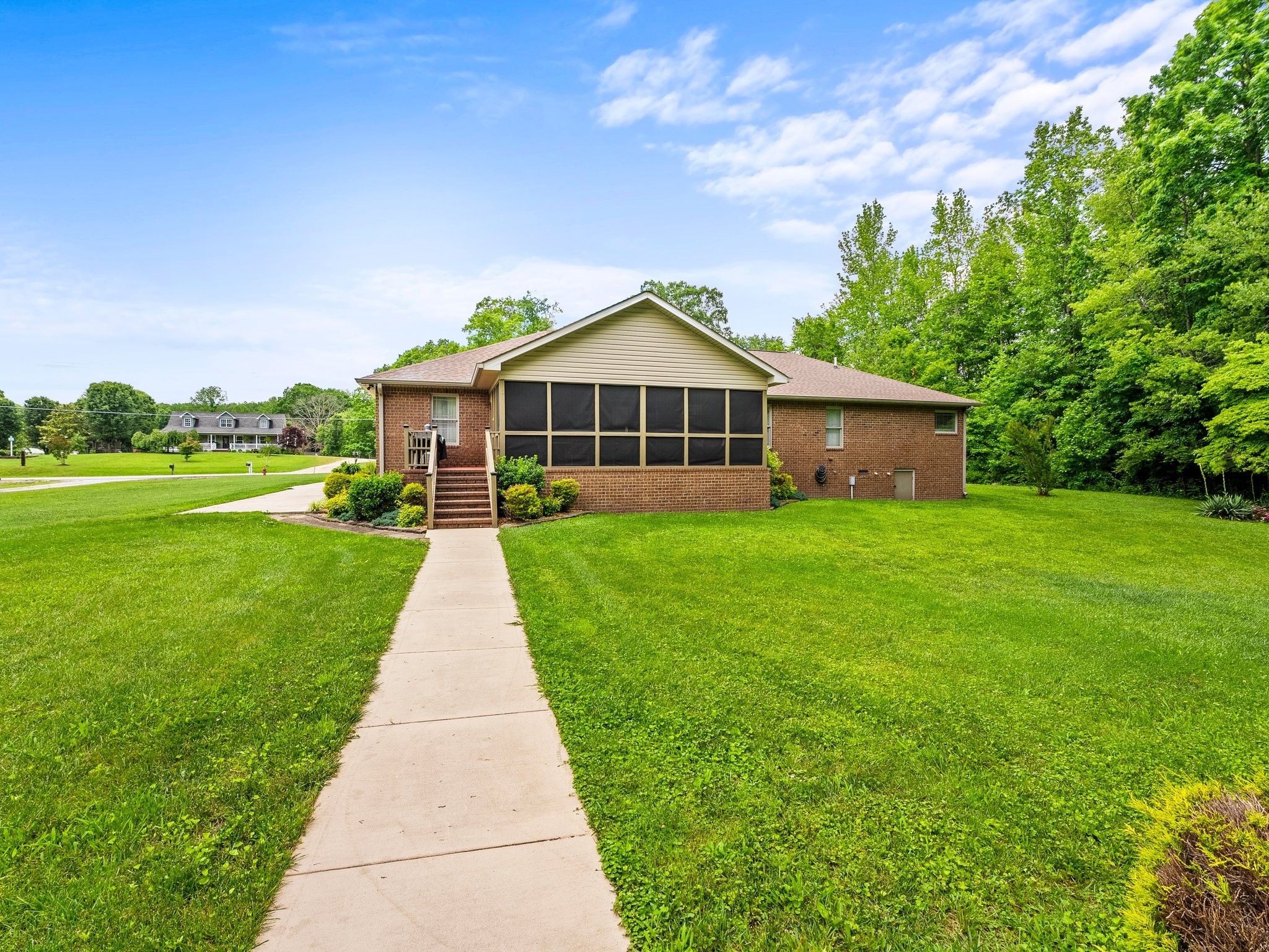 1574 Midway Road Sewanee, TN 37375 - Photo 41 of 45 a front view of a house with yard and green space