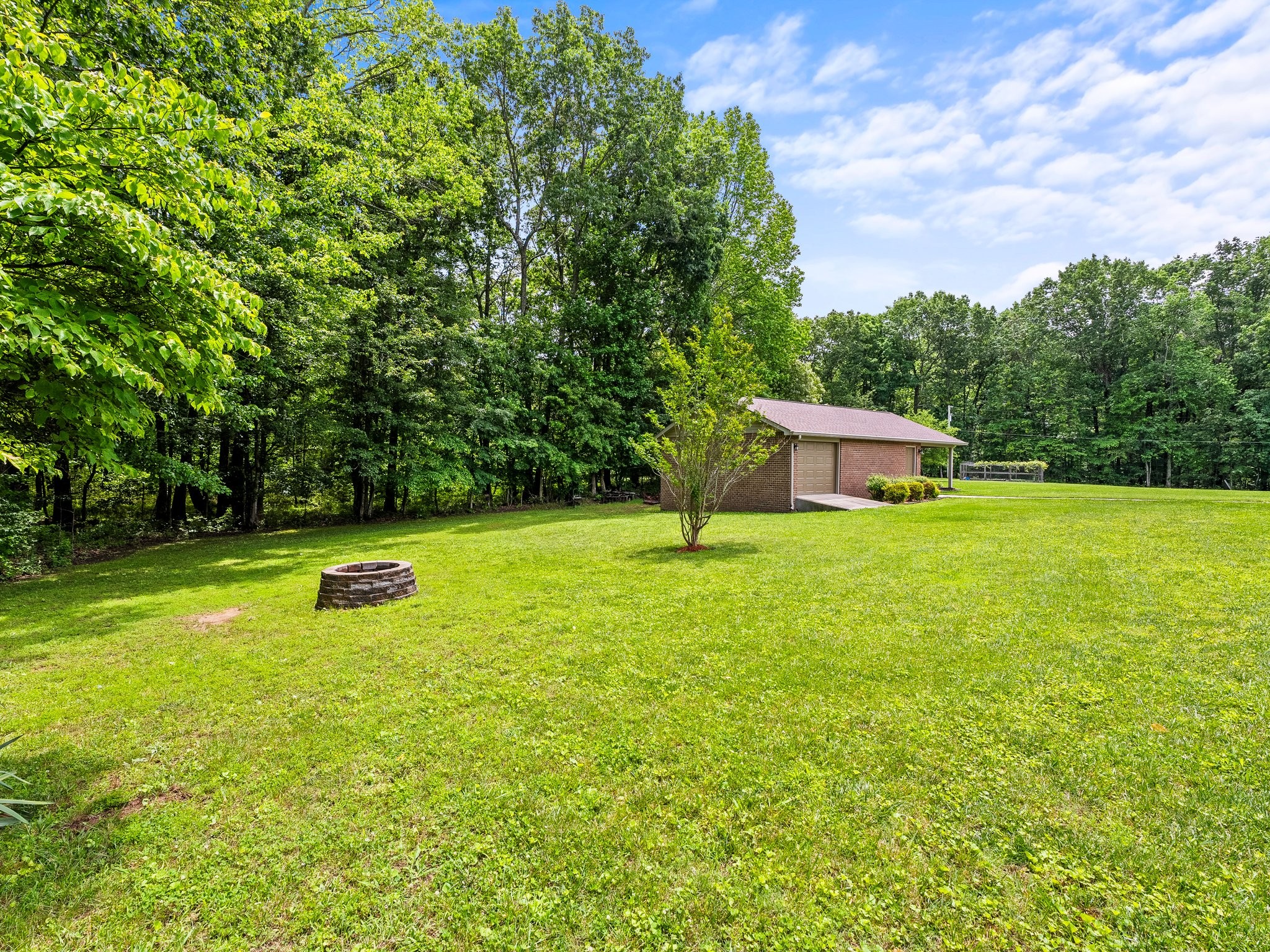 1574 Midway Road Sewanee, TN 37375 - Photo 44 of 45 a view of a house with a yard