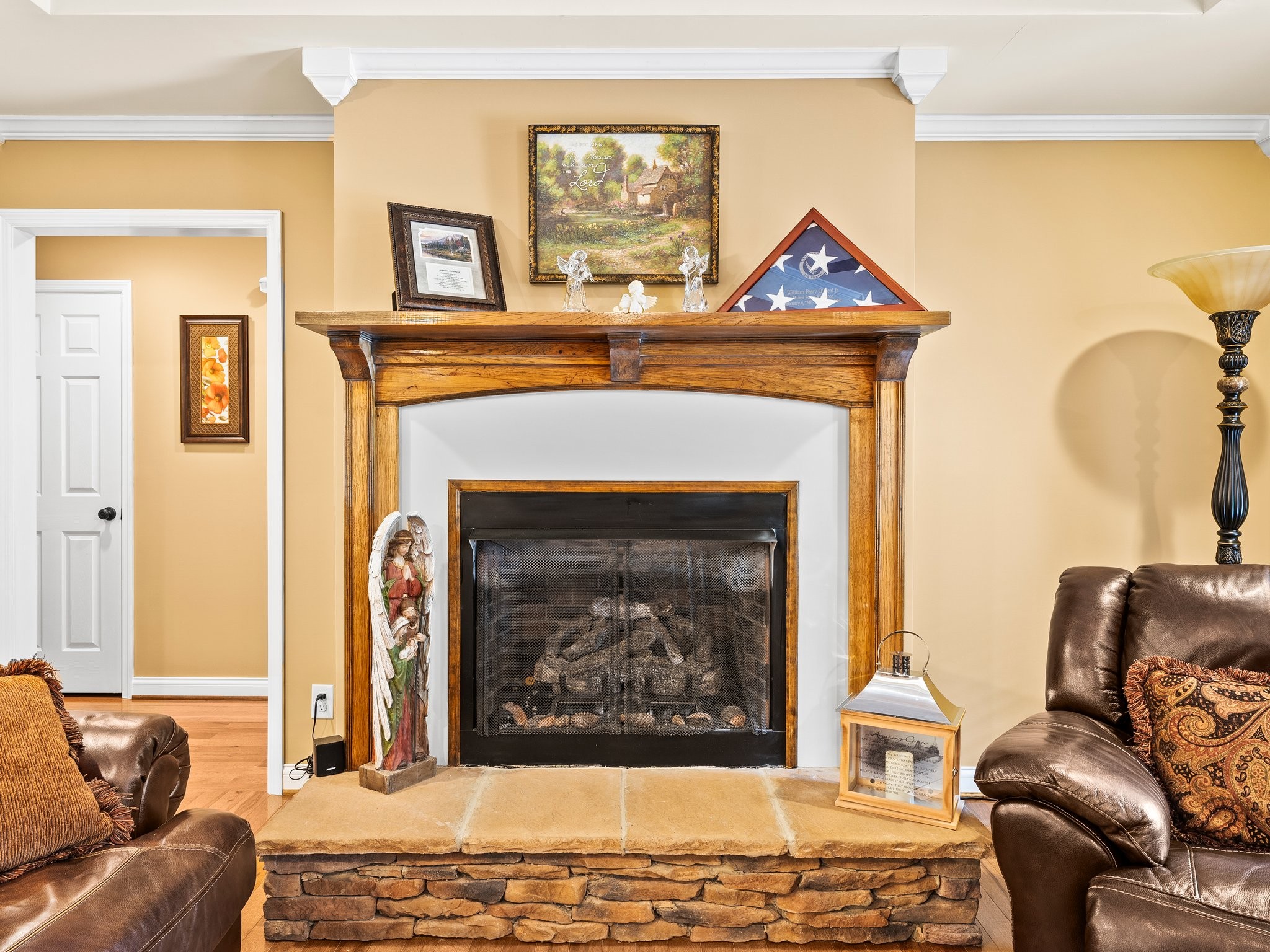 1574 Midway Road Sewanee, TN 37375 - Photo 7 of 45 a living room with furniture a flat screen tv and a fireplace