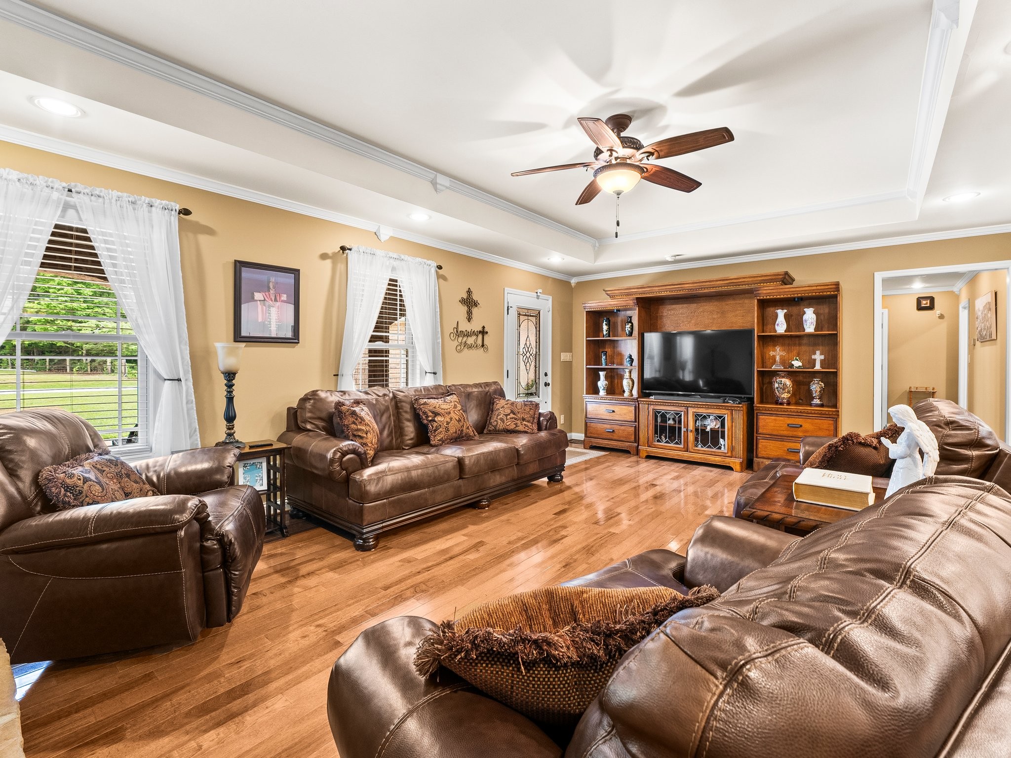 1574 Midway Road Sewanee, TN 37375 - Photo 9 of 45 a living room with furniture a large window and a chandelier