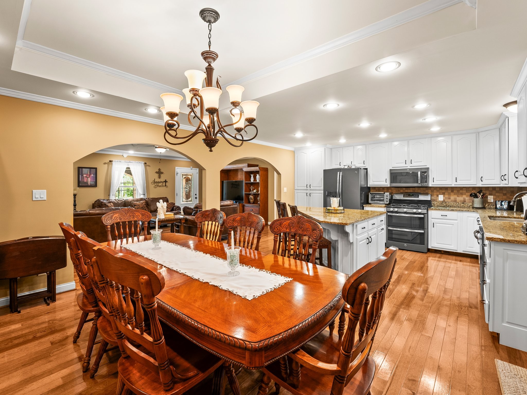 1574 Midway Road Sewanee, TN 37375 - Photo 10 of 45 a view of a dining room with furniture and a chandelier