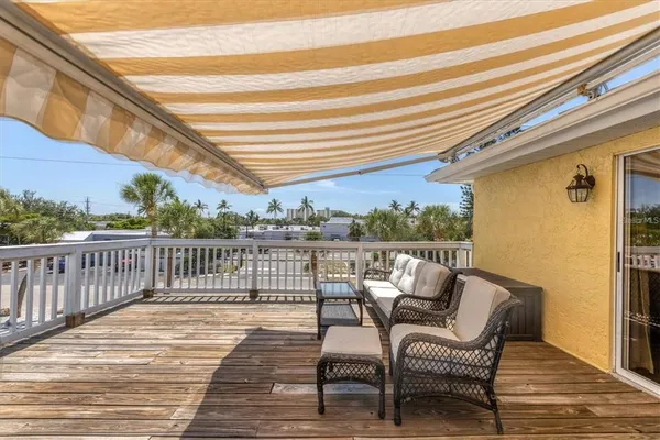 a view of a chairs on the roof deck