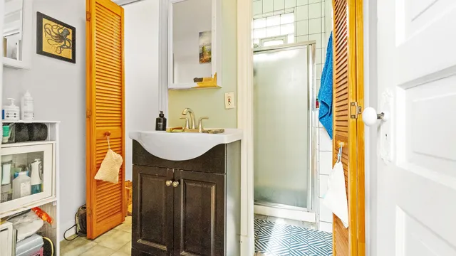 a view of an entryway with wooden floor