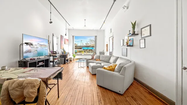 a bedroom with furniture and a bed