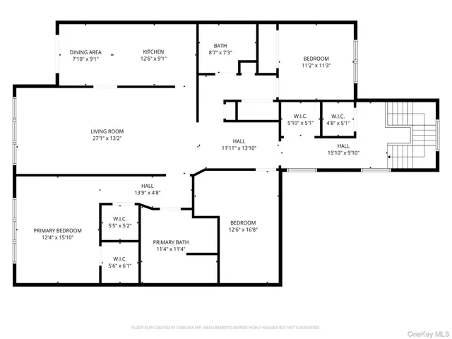 a picture of a wall with a white building and a white refrigerator