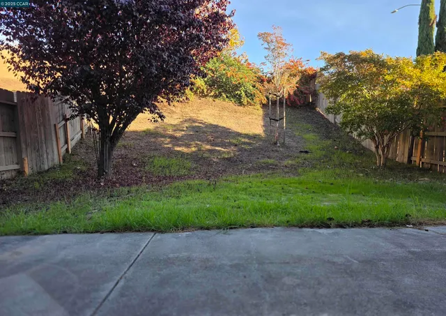 a front view of a house with garage
