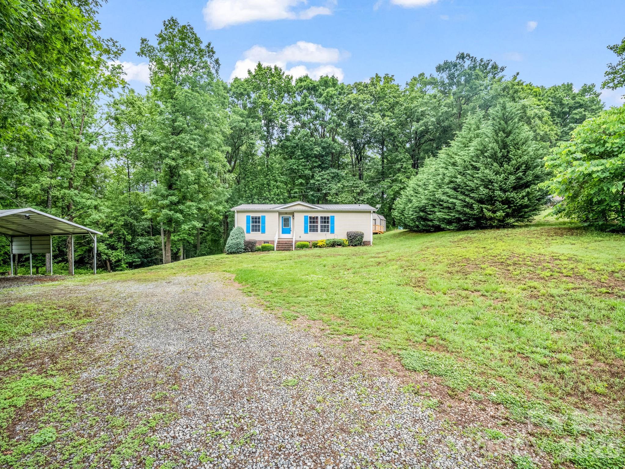 1449 Toney Road Bostic, NC 28018 - Photo 4 of 43 a house with a yard