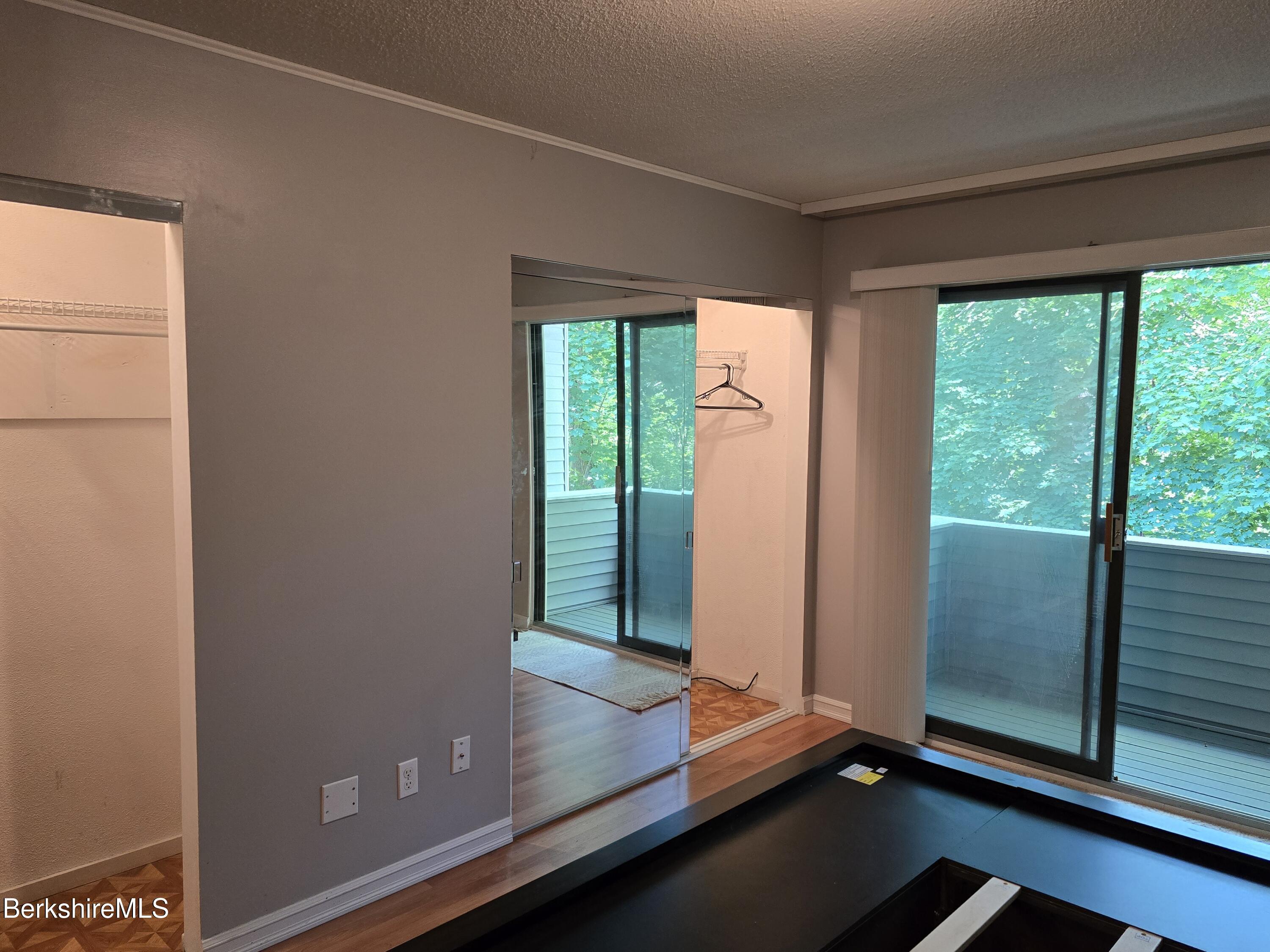 555 Russell Road, Unit J 65 Westfield, MA 01085 - Photo 10 of 20 a view of a room with sliding glass door